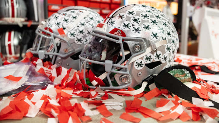 Jan 20, 2025; Atlanta, GA, USA; Detailed view of confetti with an Ohio State Buckeyes helmet after winning the CFP National Championship college football game at Mercedes-Benz Stadium. Mandatory Credit: Mark J. Rebilas-Imagn Images