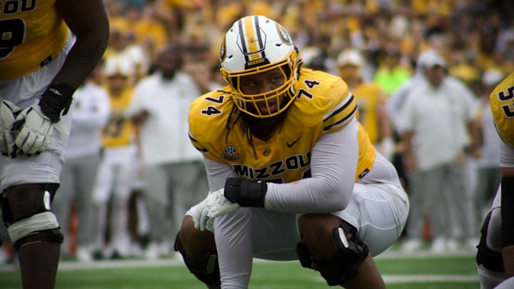 Sep 21, 2024; Columbia, Missouri, USA; Missouri Tigers right guard Cam'Ron Johnson (74) bends down ahead of a snap during a game against the Vanderbilt Commodores at Faurot Field at Memorial Stadium.