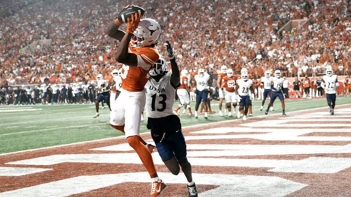 Sep 19, 2026; Austin, Texas, USA; Texas Longhorns wide receiver Cam Coleman catches a touchdown pass while defended by UTSA Roadrunners cornerback RJ Lester Jr. during the first half at Darrell K Royal-Texas Memorial Stadium. Scott Wachter-Imagn Images Sep 19, 2026; Austin, Texas, USA; Texas Longhorns wide receiver Cam Coleman catches a touchdown pass while defended by UTSA Roadrunners cornerback RJ Lester Jr. during the first half at Darrell K Royal-Texas Memorial Stadium. Scott Wachter-Imagn Images