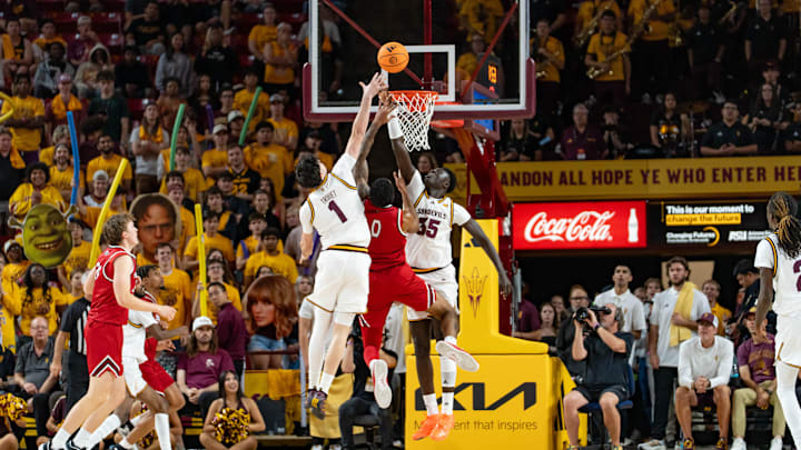 Arizona State Sun Devils Santiago Trouet (1) and Massamba Diop (35) attempt to block Southern Utah Thunderbirds Isaiah Cottrell (0) during a game at Desert Financial Arena in Tempe on Nov. 4, 2025.