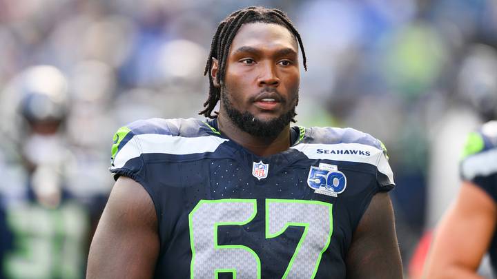 Seattle Seahawks offensive tackle Charles Cross (67) looks on from the sideline during the third quarter against the New Orleans Saints. Seattle Seahawks offensive tackle Charles Cross (67) looks on from the sideline during the third quarter against the New Orleans Saints.