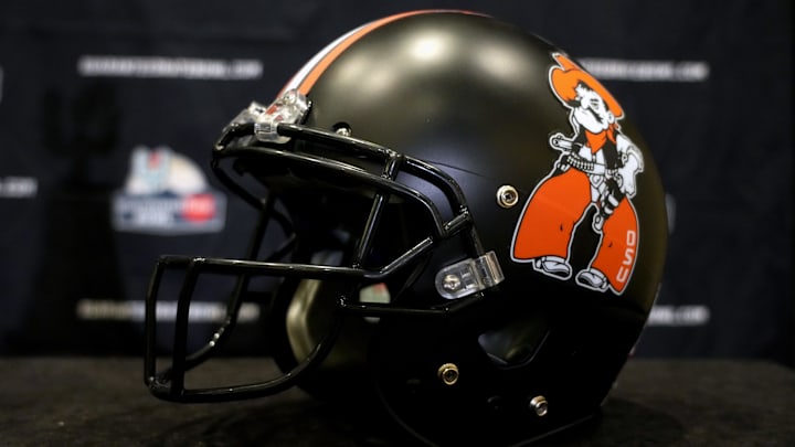 Dec 26, 2022; Scottsdale, Arizona, USA; An Oklahoma State Cowboys helmet at Guaranteed Rate Bowl media day at the JW Marriott Camelback Inn. Mandatory Credit: Kirby Lee-Imagn Images Dec 26, 2022; Scottsdale, Arizona, USA; An Oklahoma State Cowboys helmet at Guaranteed Rate Bowl media day at the JW Marriott Camelback Inn. Mandatory Credit: Kirby Lee-Imagn Images