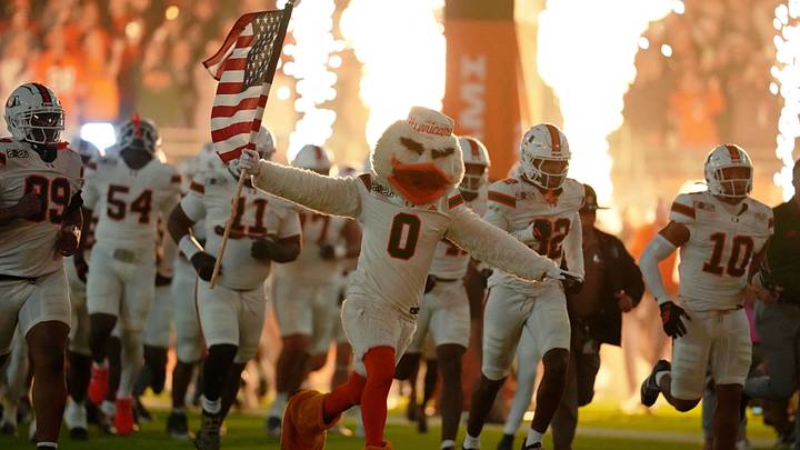 Jan 19, 2026; Miami Gardens, FL, USA; Miami Hurricanes mascot Sebastian the Ibis leads the team onto the field before the CFP National Championship college football game between the Indiana Hoosiers and the Miami Hurricanes at Hard Rock Stadium. Mandatory Credit: Kirby Lee-Imagn Images Jan 19, 2026; Miami Gardens, FL, USA; Miami Hurricanes mascot Sebastian the Ibis leads the team onto the field before the CFP National Championship college football game between the Indiana Hoosiers and the Miami Hurricanes at Hard Rock Stadium. Mandatory Credit: Kirby Lee-Imagn Images
