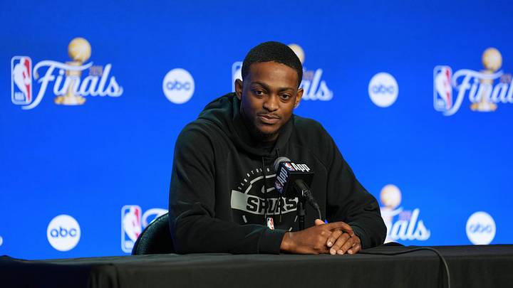 Jun 2, 2026; San Antonio, TX, USA;  San Antonio Spurs guard De'aaron Fox (4) listens to a question during media day for the 2026 NBA Finals at Frost Bank Center. Mandatory Credit: Daniel Dunn-Imagn Images