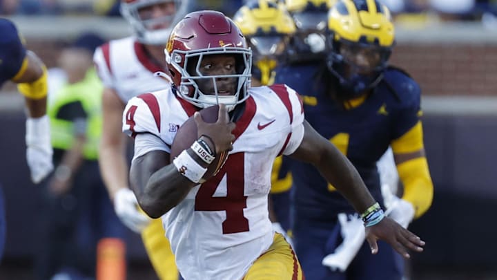 Sep 21, 2024; Ann Arbor, Michigan, USA;  USC Trojans running back Woody Marks (4) rushes against the Michigan Wolverines at Michigan Stadium. Mandatory Credit: Rick Osentoski-Imagn Images