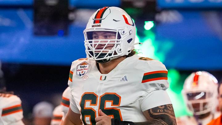 Jan 8, 2026; Glendale, AZ, USA; Miami Hurricanes offensive lineman Max Buchanan (66) against the Mississippi Rebels during the 2026 Fiesta Bowl and semifinal game of the College Football Playoff at State Farm Stadium. Mandatory Credit: Mark J. Rebilas-Imagn Images