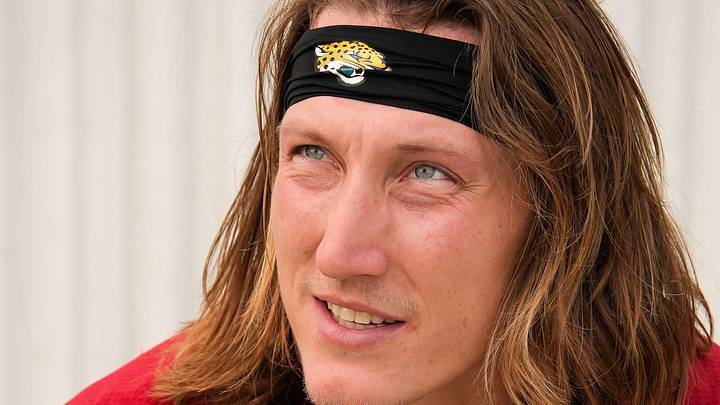 Jacksonville Jaguars quarterback Trevor Lawrence (16) talks with Jacksonville Jaguars senior director of football communications Dylan Morton after the Jaguars final Organized Team Activity on Monday, June 15, 2026 at the Miller Electric Center in Jacksonville, Fla. [Doug Engle/Florida Times-Union]