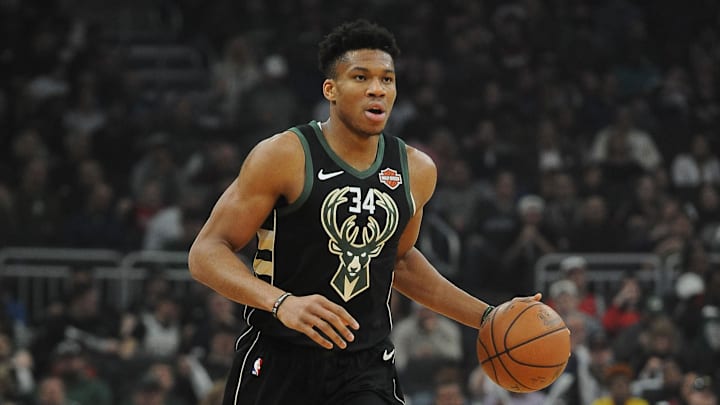 Mar 22, 2019; Milwaukee, WI, USA; Milwaukee Bucks forward Giannis Antetokoumpo (34) brings the ball up the court against the Miami Heat at Fiserv Forum. Mandatory Credit: Michael McLoone-Imagn Images