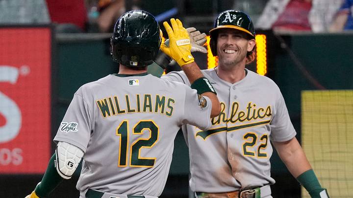 Sep 2, 2026; Arlington, Texas, USA; Athletics shortstop Alika Williams (12) is greeted at home plate by second baseman Jeff McNeil (22) after hitting a two-run home run against the Texas Rangers during the fifth inning at Globe Life Field. Mandatory Credit: Raymond Carlin III-Imagn Images Sep 2, 2026; Arlington, Texas, USA; Athletics shortstop Alika Williams (12) is greeted at home plate by second baseman Jeff McNeil (22) after hitting a two-run home run against the Texas Rangers during the fifth inning at Globe Life Field. Mandatory Credit: Raymond Carlin III-Imagn Images