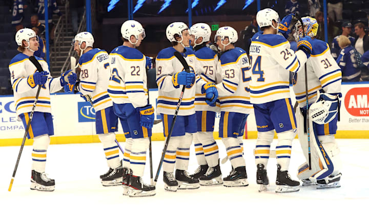 Apr 15, 2024; Tampa, Florida, USA;  Buffalo Sabres goaltender Eric Comrie (31), center Dylan Cozens