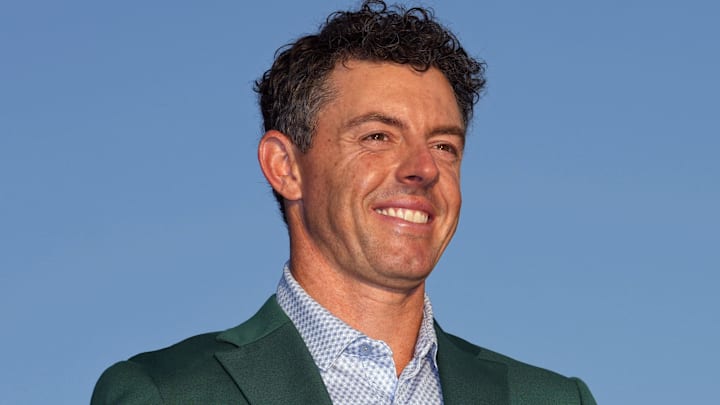 Apr 12, 2026; Augusta, Georgia, USA; Rory McIlroy holds the Masters championship trophy during the green jacket ceremony after the final round of the Masters Tournament at Augusta National Golf Club.