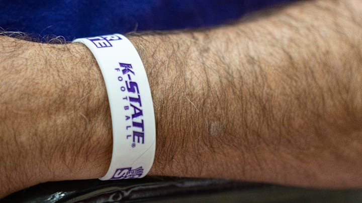Friends and family watch as Eva Lye, Daniel Imburgia, Logan Bartley and Bradley Martino sign their letters of intent during a signing day ceremony at First Baptist Academy in Naples, Fla., on Wednesday, Dec. 4, 2024. Lye will go to High Point University for golf; Imburgia will attend Franklin and Marshall College for football; Bartley will go to Kansas State University for football; and Martino will play football at the University of Minnesota.