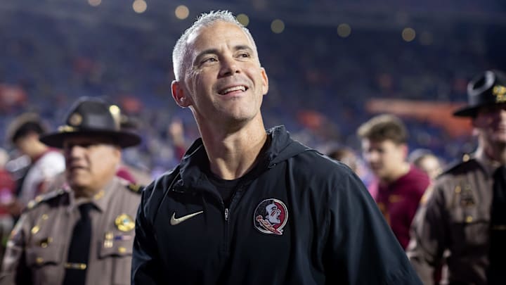 Florida State Seminoles head coach Mike Norvell smiles to the crowd after the game against the Florida Gators at Steve Spurrier Field at Ben Hill Griffin Stadium in Gainesville, FL on Saturday, November 25, 2023. [Matt Pendleton/Gainesville Sun]