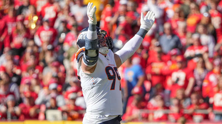 Nov 10, 2024; Kansas City, Missouri, USA; Denver Broncos defensive end Zach Allen (99) celebrates after a play against the Kansas City Chiefs during the game at GEHA Field at Arrowhead Stadium. Mandatory Credit: Denny Medley-Imagn Images