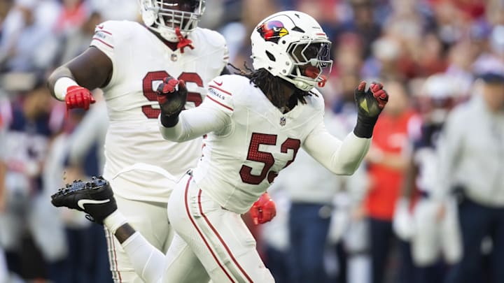 Dec 15, 2024; Glendale, Arizona, USA; Arizona Cardinals linebacker Baron Browning (53) celebrates a sack against the New England Patriots in the first half at State Farm Stadium. Mandatory Credit: Mark J. Rebilas-Imagn Images