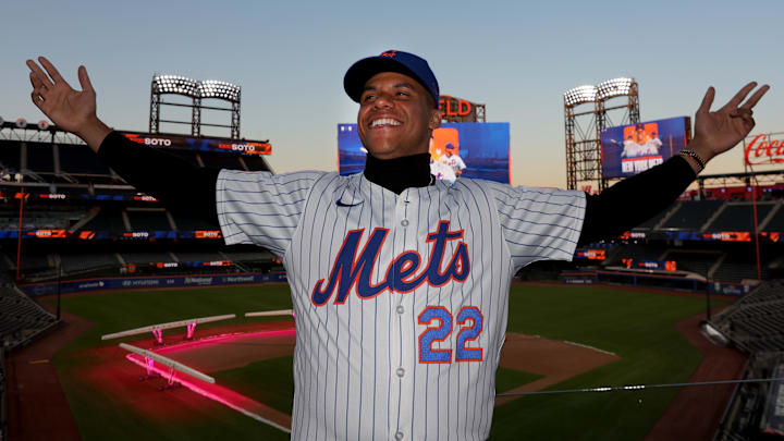 New York Mets right fielder Juan Soto poses for photos during his introductory press conference at Citi Field. New York Mets right fielder Juan Soto poses for photos during his introductory press conference at Citi Field.