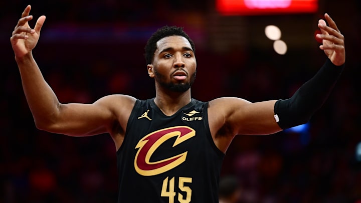 Nov 21, 2025; Cleveland, Ohio, USA; Cleveland Cavaliers guard Donovan Mitchell (45) reacts after a basket against the Indiana Pacers during the second half at Rocket Arena. Mandatory Credit: Ken Blaze-Imagn Images