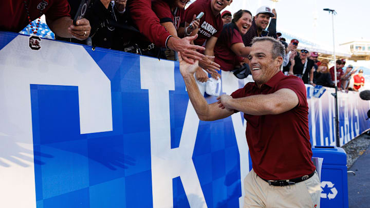 Sep 7, 2024; Lexington, Kentucky, USA; South Carolina Gamecocks head coach Shane Beamer high fives fans after the game against the Kentucky Wildcats at Kroger Field. Mandatory Credit: Jordan Prather-Imagn Images