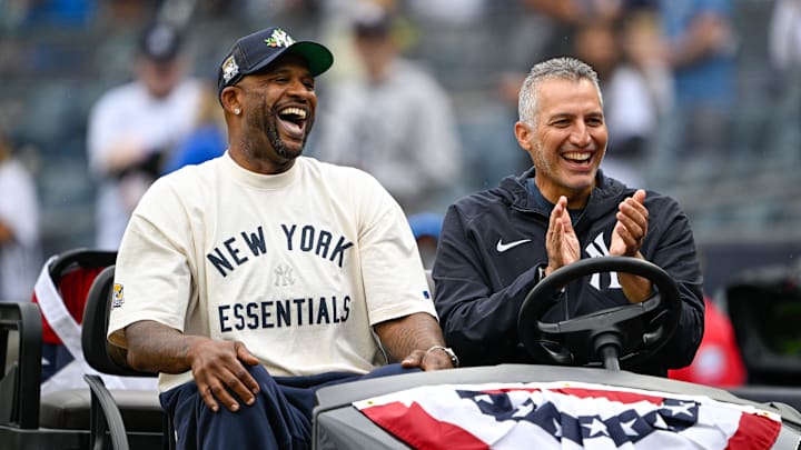 Sep 7, 2025; Bronx, New York, USA; Former Yankee CC Sabathia drives onto the field with former Yankee Andy Pettitte before the game against the Toronto Blue Jays at Yankee Stadium. Mandatory Credit: Mark Smith-Imagn Images