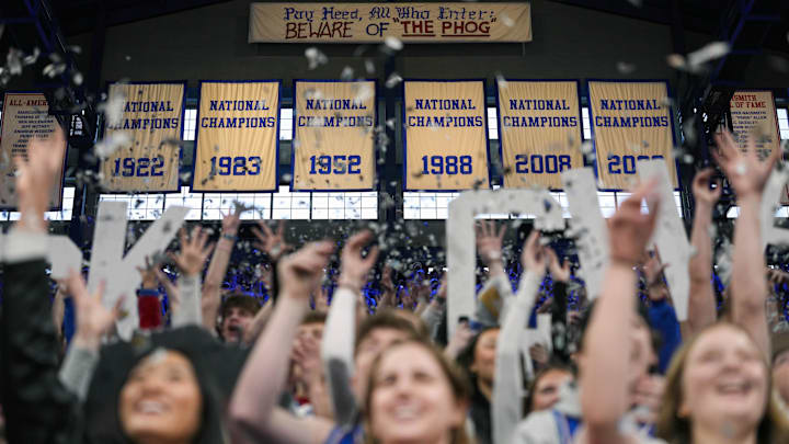Feb 7, 2026; Lawrence, Kansas, USA; Kansas Jayhawks students throw newspaper prior to a game against the Kansas Jayhawks at Allen Fieldhouse. Mandatory Credit: Jay Biggerstaff-Imagn Images