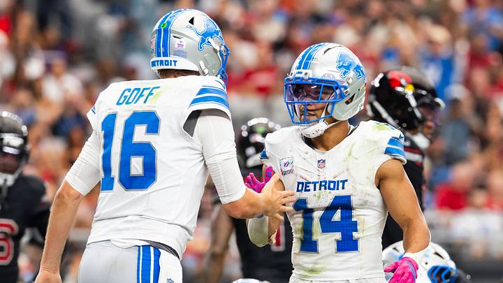 Oct 11, 2026; Glendale, Arizona, USA;  Detroit Lions quarterback Jared Goff (16) celebrates a touchdown with wide receiver Amon-Ra St. Brown (14) against the Arizona Cardinals at State Farm Stadium.  Mandatory Credit: Mark J. Rebilas-Imagn Images