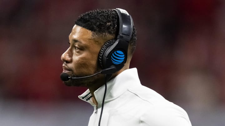 Jan 20, 2025; Atlanta, GA, USA; Notre Dame Fighting Irish head coach Marcus Freeman against the Ohio State Buckeyes during the CFP National Championship college football game at Mercedes-Benz Stadium. Mandatory Credit: Mark J. Rebilas-Imagn Images
