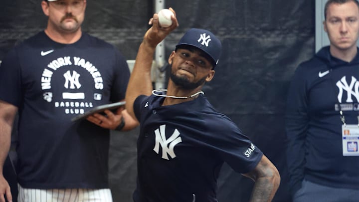 Feb 13, 2026; Tampa, FL, USA;New York Yankees pitcher Camilo Doval (75) throws a bullpen session during spring training practices at George M. Steinbrenner Field. Mandatory Credit: Kim Klement Neitzel-Imagn Images