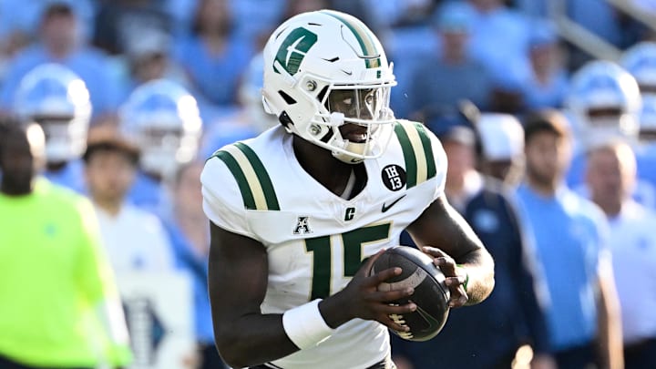 Sep 7, 2024; Chapel Hill, North Carolina, USA; Charlotte 49ers quarterback Deshawn Purdie (15) looks to pass in the third quarter at Kenan Memorial Stadium. Mandatory Credit: Bob Donnan-Imagn Images