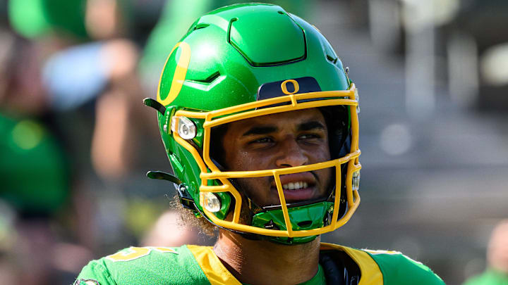 Aug 31, 2024; Eugene, Oregon, USA; Oregon Ducks quarterback Dante Moore (5) warms up before the game against the Idaho Vandals at Autzen Stadium. Mandatory Credit: Craig Strobeck-Imagn Images