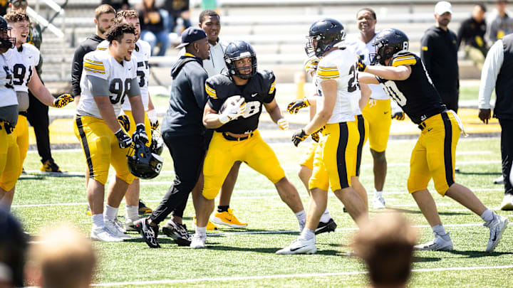 Apr 26, 2025; Iowa City, IA, USA; Desmond King reacts as Iowa running back Kamari Moulton (28) gets tackled during a spring NCAA football open practice at Kinnick Stadium. Mandatory Credit: Joseph Cress/For the Register