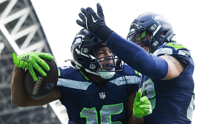Nov 3, 2024; Seattle, Washington, USA; Seattle Seahawks wide receiver Tyler Lockett (16) celebrates with tight end AJ Barner (88) after catching a touchdown pass against the Los Angeles Rams during the second quarter at Lumen Field. Nov 3, 2024; Seattle, Washington, USA; Seattle Seahawks wide receiver Tyler Lockett (16) celebrates with tight end AJ Barner (88) after catching a touchdown pass against the Los Angeles Rams during the second quarter at Lumen Field.