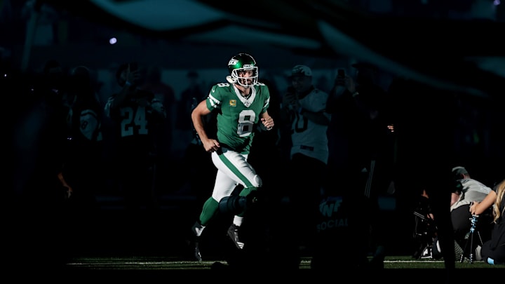 Sep 19, 2024; East Rutherford, New Jersey, USA; New York Jets quarterback Aaron Rodgers (8) is introduced before a game against the New England Patriots at MetLife Stadium. Mandatory Credit: Brad Penner-Imagn Images