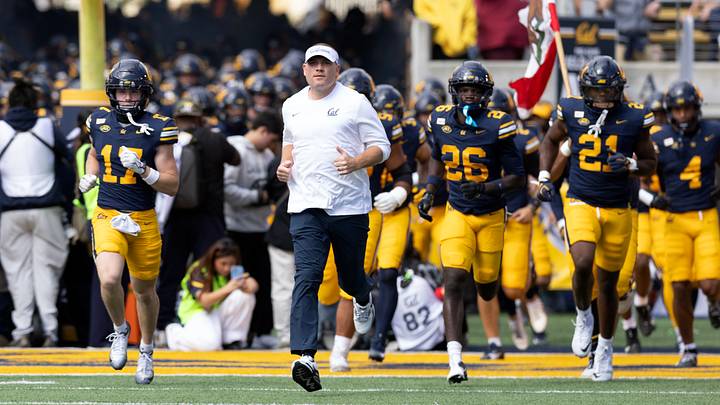 Tosh Lupoi leads Cal onto the field last week Tosh Lupoi leads Cal onto the field last week