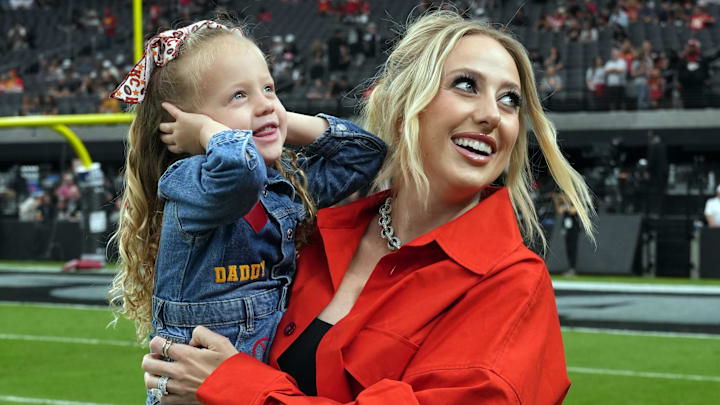 Brittany Mahomes, the wife of Kansas City Chiefs quarterback Patrick Mahomes (15) holds daughter Sterling Mahomes during the game against the Las Vegas Raiders.