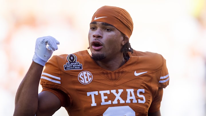 Dec 21, 2024; Austin, Texas, USA; Texas Longhorns wide receiver DeAndre Moore Jr. (0) against the Clemson Tigers during the CFP National playoff first round at Darrell K Royal-Texas Memorial Stadium. Mandatory Credit: Mark J. Rebilas-Imagn Images