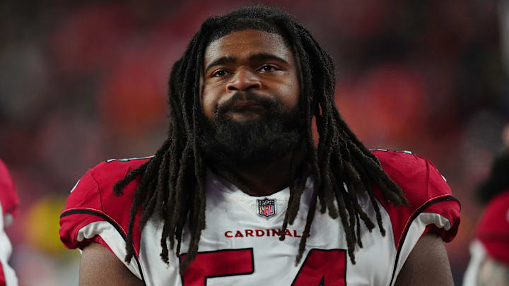 Dec 18, 2022; Denver, Colorado, USA; Arizona Cardinals guard Lecitus Smith (54) reacts on the