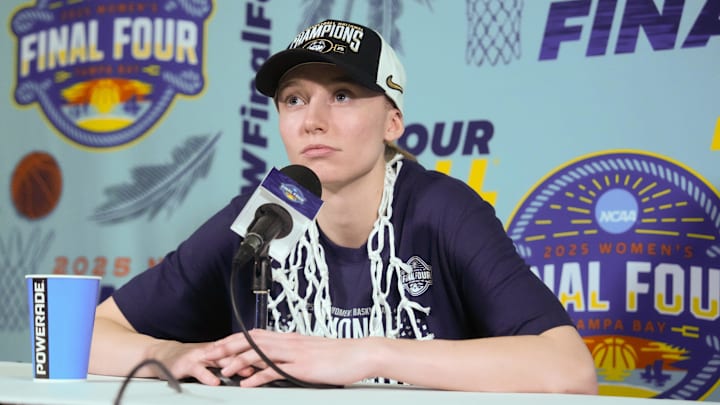 Apr 6, 2025; Tampa, FL, USA; Connecticut Huskies guard Paige Bueckers (5) speaks to the media after the national championship of the women's 2025 NCAA tournament against the South Carolina Gamecocks at Amalie Arena. Mandatory Credit: Kirby Lee-Imagn Images Apr 6, 2025; Tampa, FL, USA; Connecticut Huskies guard Paige Bueckers (5) speaks to the media after the national championship of the women's 2025 NCAA tournament against the South Carolina Gamecocks at Amalie Arena. Mandatory Credit: Kirby Lee-Imagn Images