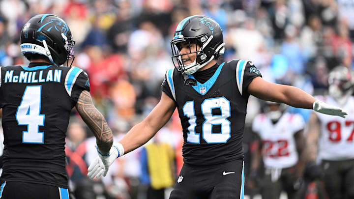 Carolina Panthers wide receiver Jalen Coker (18) celebrates with wide receiver Tetairoa McMillan (4) after a play Carolina Panthers wide receiver Jalen Coker (18) celebrates with wide receiver Tetairoa McMillan (4) after a play