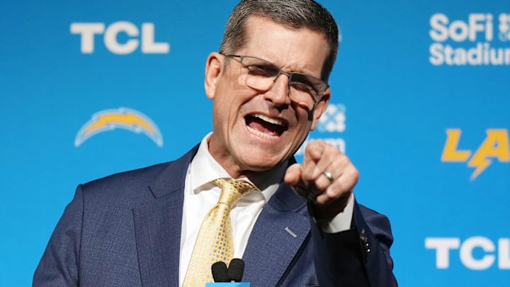 Coach Jim Harbaugh speaks at an introductory press conference