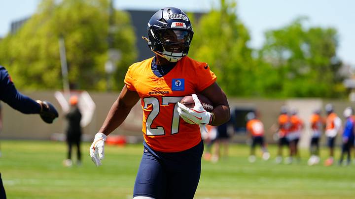 Denver Broncos running back J.K. Dobbins (27) during mini camp at Broncos Park. Mandatory Credit: Ron Chenoy-Imagn Images