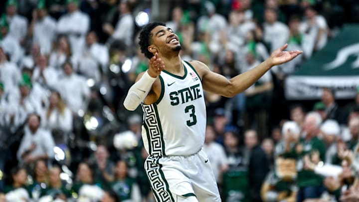 Michigan State's Jaden Akins gets the Izzone pumped up after making a 3-pointer against Michigan
