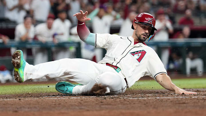Sep 29, 2024; Phoenix, Arizona, USA; Arizona Diamondbacks outfielder Randal Grichuk (15) slides and scores a run against the San Diego Padres during the fourth inning at Chase Field. Mandatory Credit: Joe Camporeale-Imagn Images Sep 29, 2024; Phoenix, Arizona, USA; Arizona Diamondbacks outfielder Randal Grichuk (15) slides and scores a run against the San Diego Padres during the fourth inning at Chase Field. Mandatory Credit: Joe Camporeale-Imagn Images