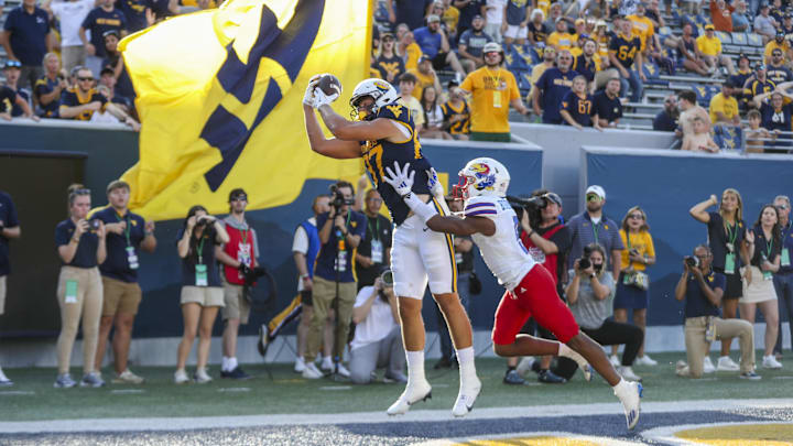 Sep 21, 2024; Morgantown, West Virginia, USA; West Virginia Mountaineers tight end Kole Taylor (87) catches a pass for a two point conversion during the fourth quarter against the Kansas Jayhawks at Mountaineer Field at Milan Puskar Stadium.