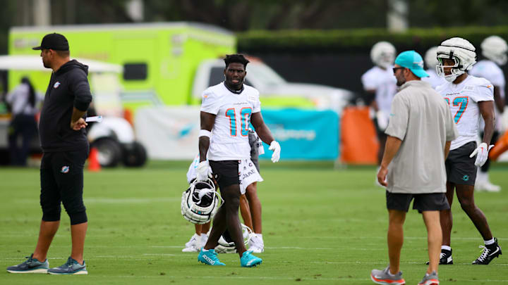 Jul 24, 2024; Miami Gardens, FL, USA; Miami Dolphins wide receiver Tyreek Hill (10) looks on during training camp at Baptist Health Training Complex. Mandatory Credit: Sam Navarro-USA TODAY Sports