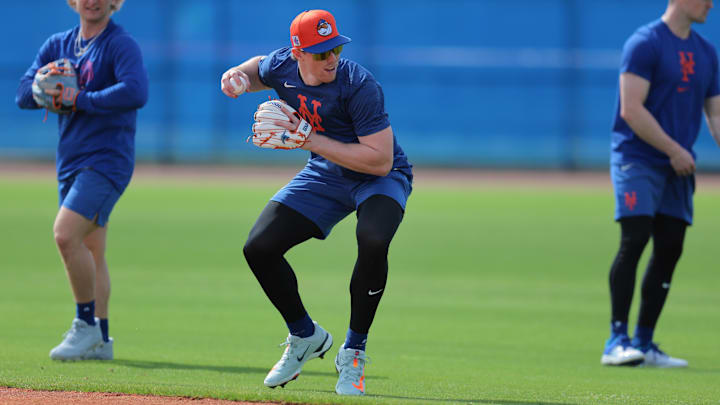 Feb 12, 2025; Port St. Lucie, FL, USA; New York Mets third base Brett Baty (7) works during a Spring Training workout at Clover Park. Mandatory Credit: Sam Navarro-Imagn Images