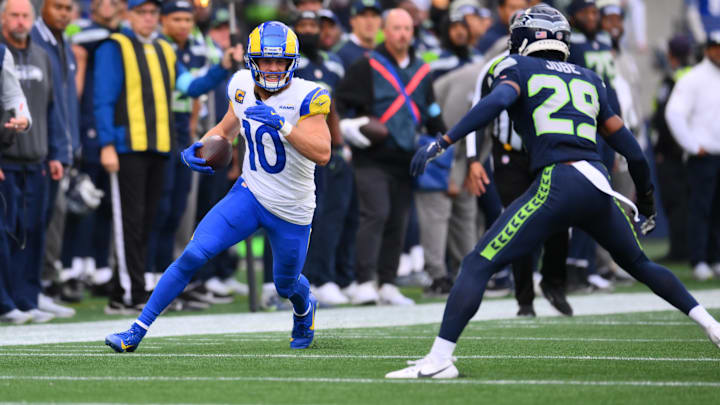 Los Angeles Rams wide receiver Cooper Kupp carries the ball after a catch against the Seattle Seahawks.