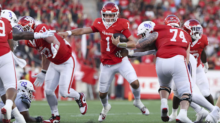 Houston Cougars quarterback Conner Weigman (1) runs with the ball during the first quarter against the Stephen F. Austin Lumberjacks at TDECU Stadium.
