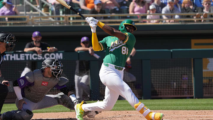 Mar 6, 2026; Mesa, Arizona, USA; Athletics shortstop Leo de Vries (83) hits against the Colorado Rockies in the second inning at Hohokam Stadium. Mandatory Credit: Rick Scuteri-Imagn Images Mar 6, 2026; Mesa, Arizona, USA; Athletics shortstop Leo de Vries (83) hits against the Colorado Rockies in the second inning at Hohokam Stadium. Mandatory Credit: Rick Scuteri-Imagn Images