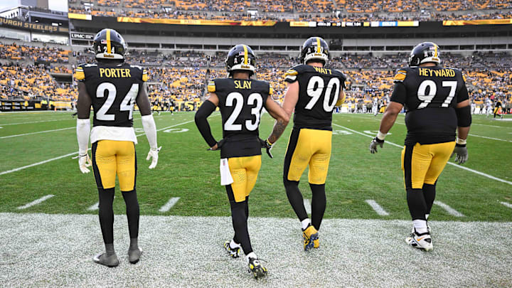 Football players walk onto the fiel Football players walk onto the fiel