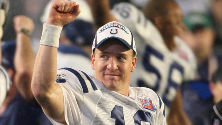Feb 4, 2007; Miami, FL, USA;  Indianapolis Colts quarterback Peyton Manning (18) celebrates after the Indianapolis Colts defeated the Chicago Bears 29-17 in Super Bowl XLI at Dolphins Stadium.  Mandatory Credit: Matthew Emmons-Imagn Images Copyright © 2007 Matthew Emmons